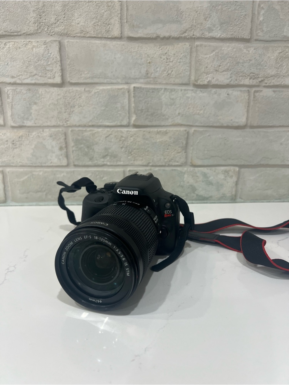 Canon EOS Rebel SL1 DSLR Camera + 18-135mm Lens, Battery, Charger & Memory Card
